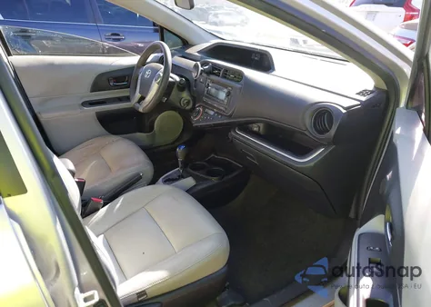 2014 Toyota Prius C Two from USA, damaged, VIN JTDKDTB35E1567277